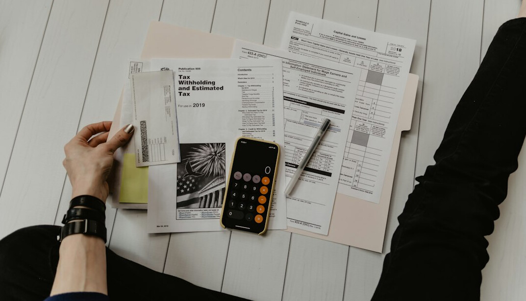 woman calculating budget